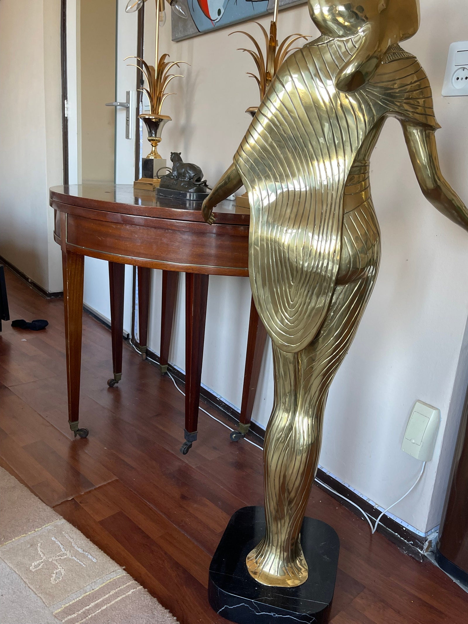 Vintage Egyptian Goddess Selket Statue โ a beautifully crafted brass figurine depicting the mythological goddess of protection and healing. This Egyptian sculpture is perfect for collectors of Egyptian antiques and ancient Egypt decor.