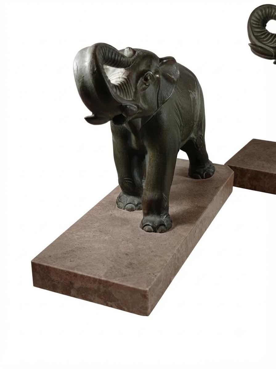 Art Deco Elephant Bookends Pair, Patinated Metal on Marble Bases — French Style, circa 1920s–1930s