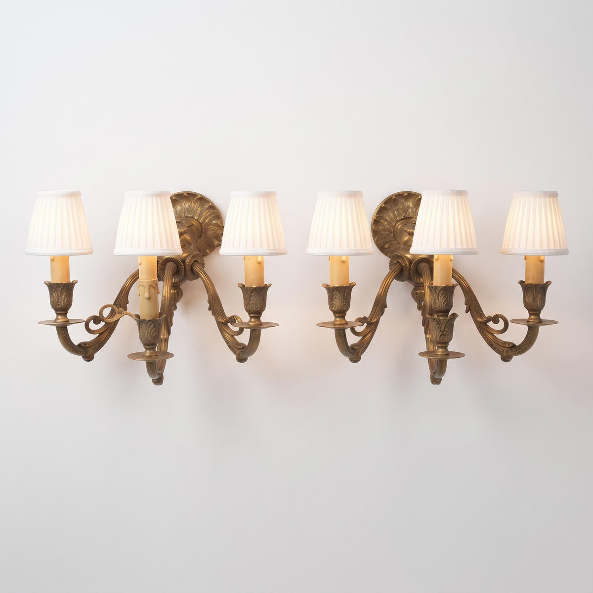 Pair of French Gilt Bronze Three-Arm Wall Sconces, Louis XV Style — France, Early 20th Century