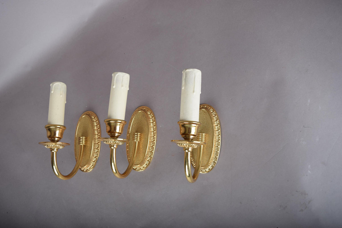 Louis XVI Style Wall Sconces Set of Three, Gilt Metal Single Arm Sconces with Oval Beaded Backplates