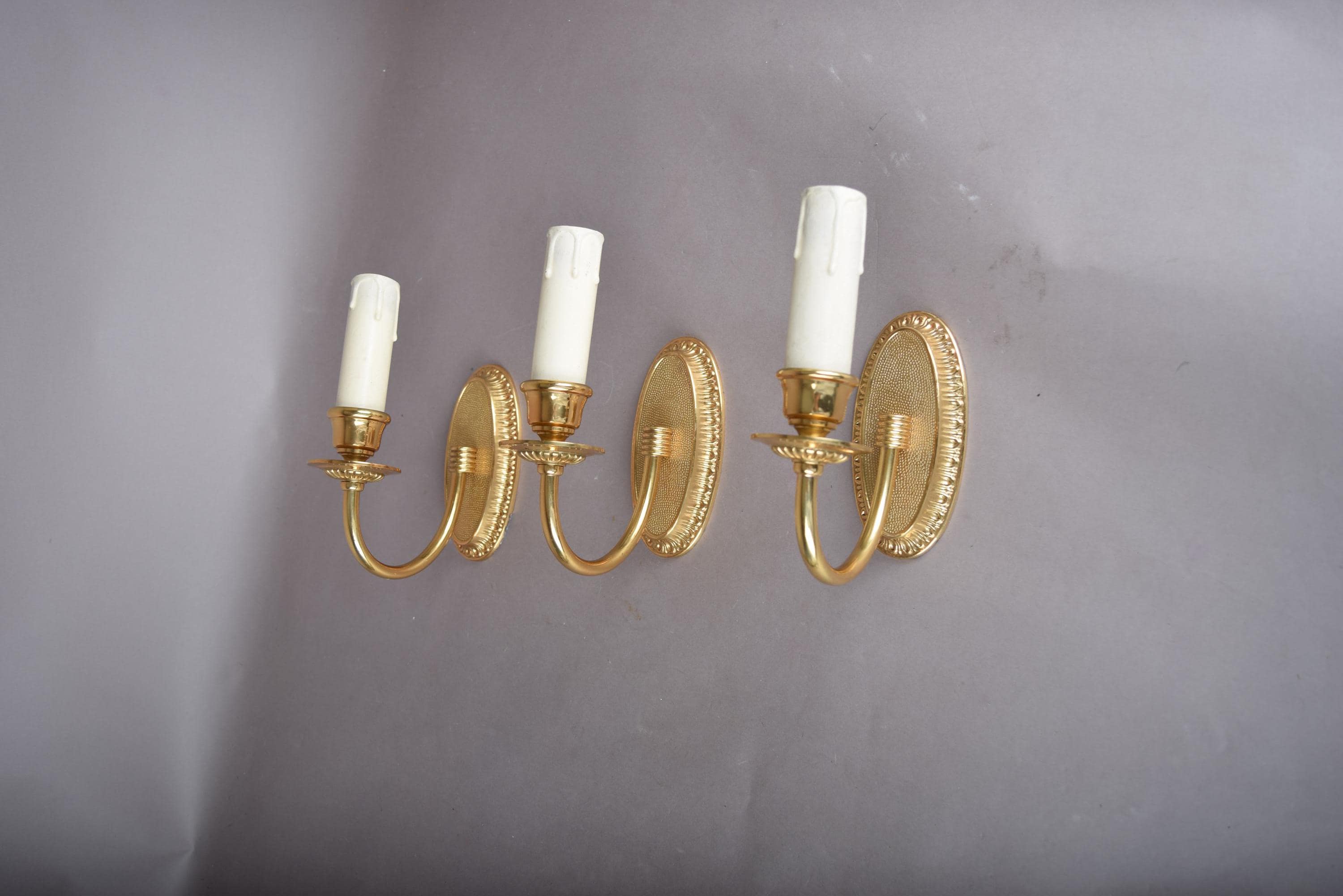 Louis XVI Style Wall Sconces Set of Three, Gilt Metal Single Arm Sconces with Oval Beaded Backplates