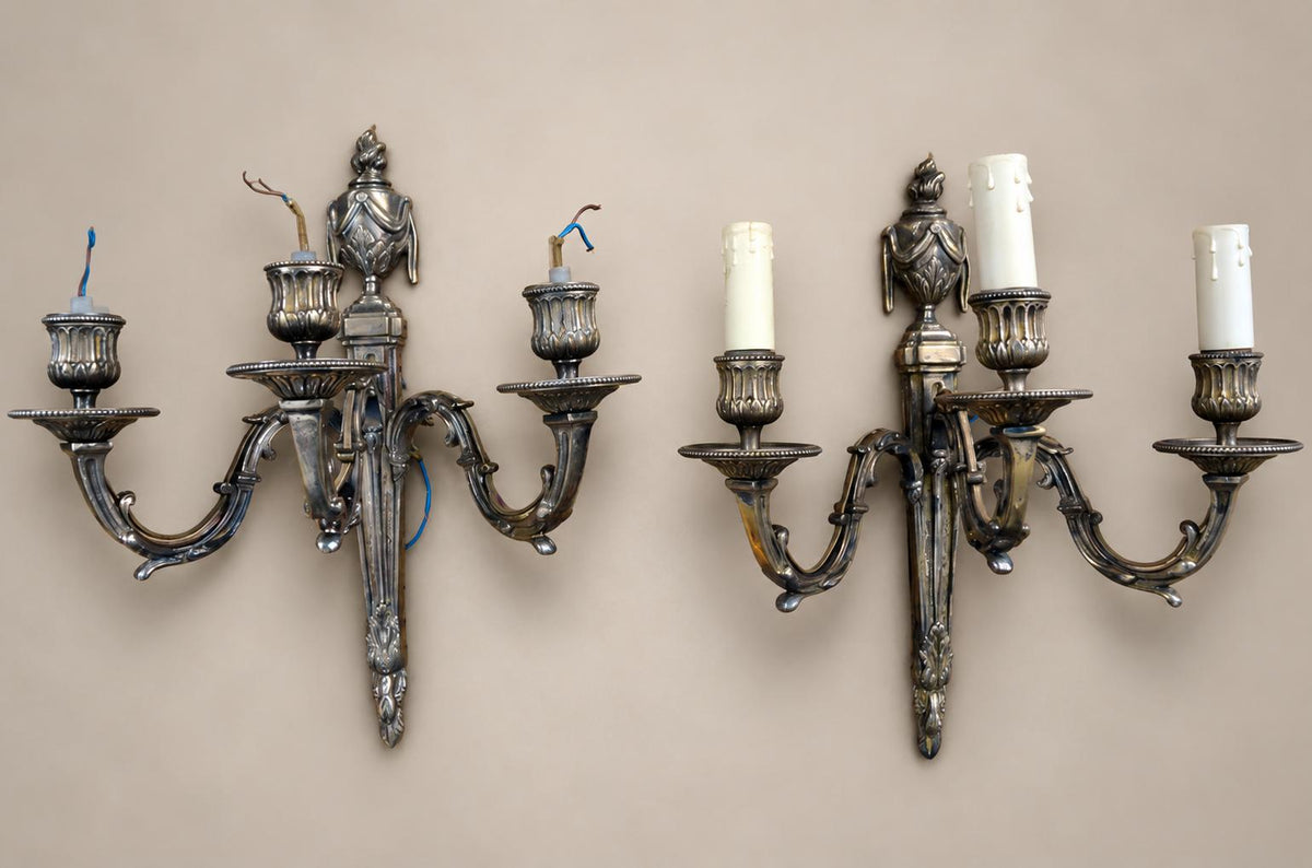 Pair of French Neoclassical Style Patinated Metal Three-Light Wall Sconces Mid 20th