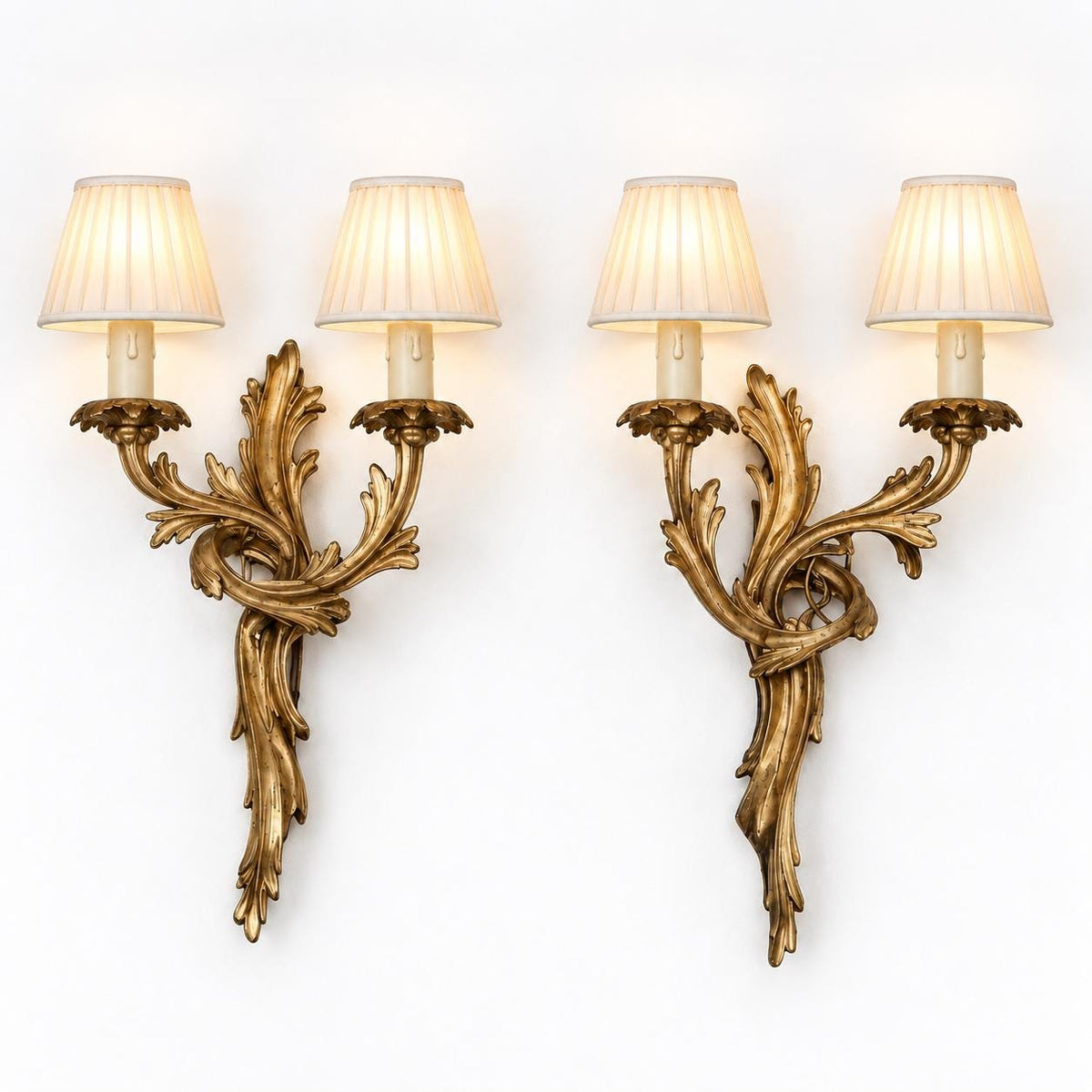 Pair of French Gilt Bronze Two-Arm Wall Sconces, Louis XV Rocaille — France, Late 19th Century