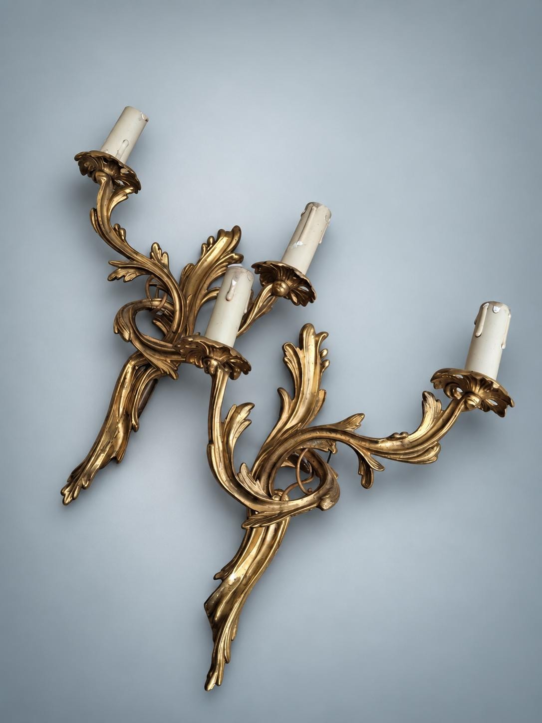 Pair of French Gilt Bronze Two-Arm Wall Sconces, Louis XV Rocaille — France, Late 19th Century