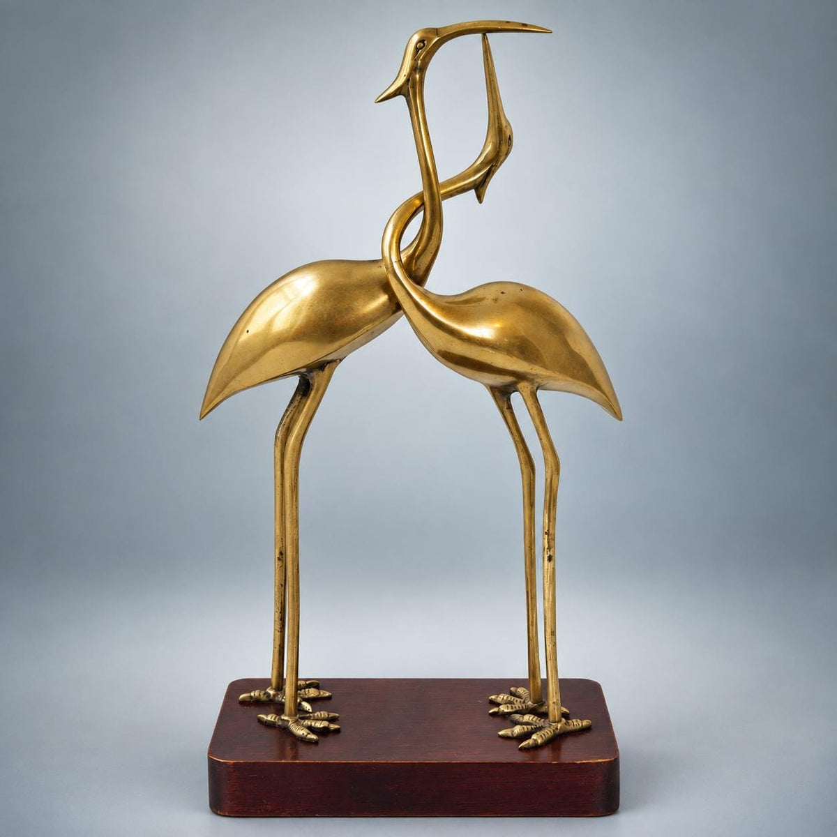 Vintage Brass Intertwined Herons Sculpture on Lacquered Wood Base — France, circa 1970