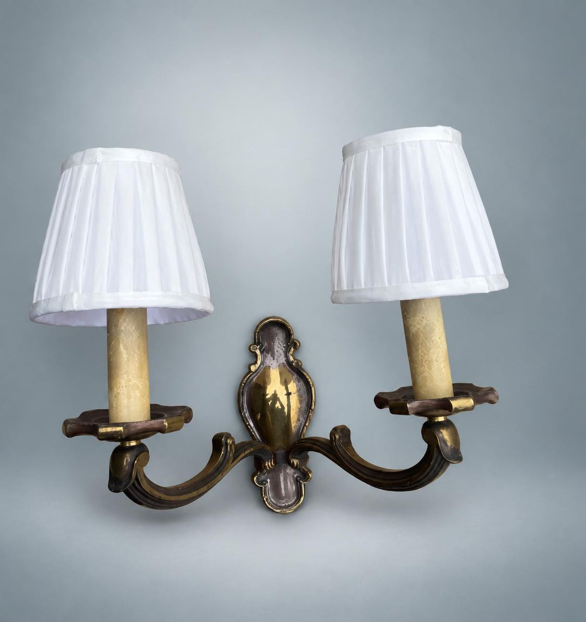 Pair of French Patinated Brass Two-Arm Wall Sconces, with White Fabric Shades — France, circa 1950