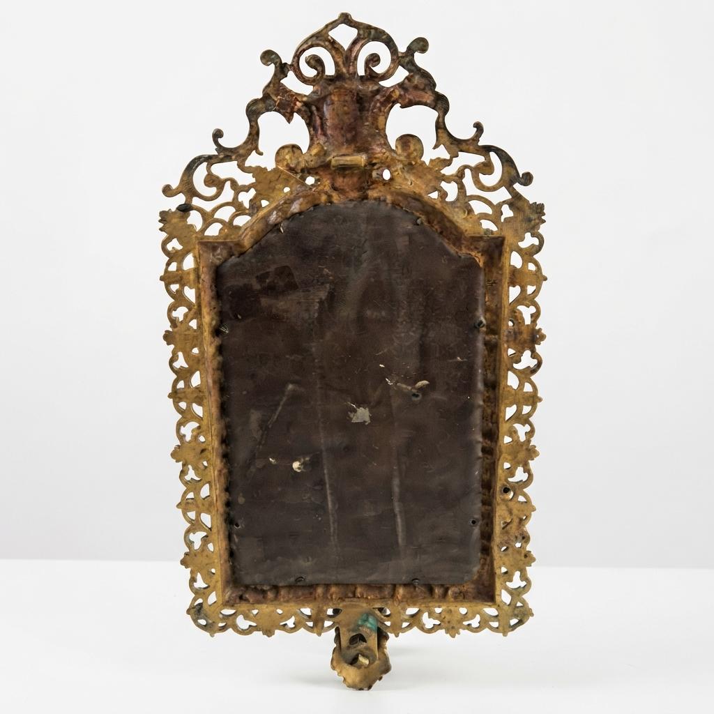 Antique Bronze Mirror Wall Sconce, Renaissance Style with Three Candle Arms and Mask Crest — Continental, 19th Century