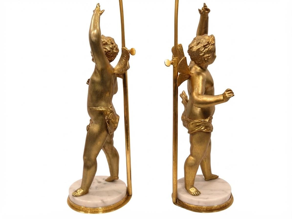Pair of French Gilt Putti Table Lamps, Winged Cherub Figures on White Marble Bases — France, Early 20th Century