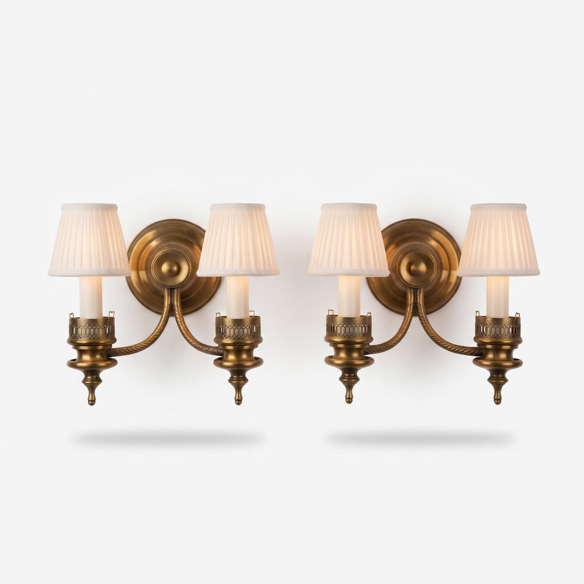 Pair of French Style Brass Two-Light Wall Sconces — Scrolled Arms with Pierced Candle Cup Galleries