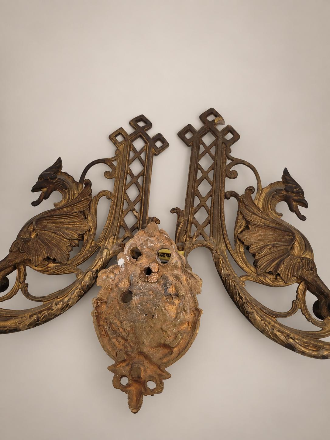 Pair of French Aesthetic Movement Patinated Metal Dragon Motif Two-Light Wall Sconces