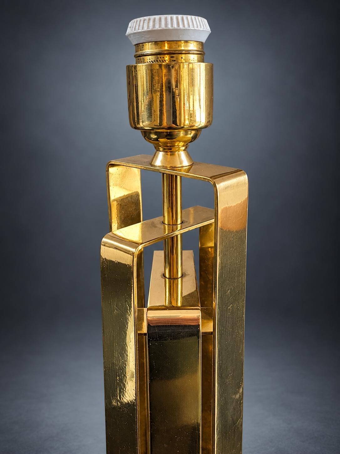 Gold-Tone Metal Table Lamp, Folded Strip Column with Bolted Feet, Round Black Base, Hollywood Regency Industrial Design