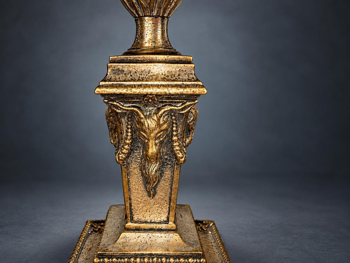 Pair of Neoclassical Candlesticks, Silver-Tone Metal with Ram's Heads and Garlands, Fluted Urn Sconces, Warm Worn Finish