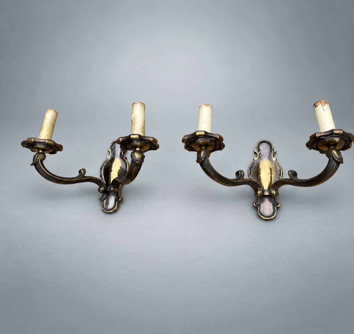 Pair of French Patinated Brass Two-Arm Wall Sconces, with White Fabric Shades — France, circa 1950