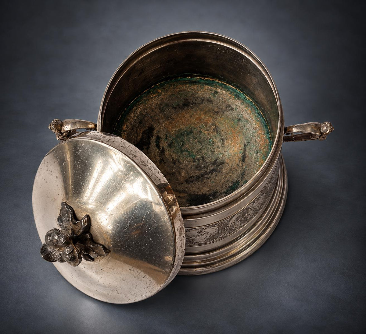 Lidded Bonbonnière in Silver-Tone Metal, Embossed Mask and Scroll Band, Figural Handles, Leaf Finial, Renaissance Revival Style