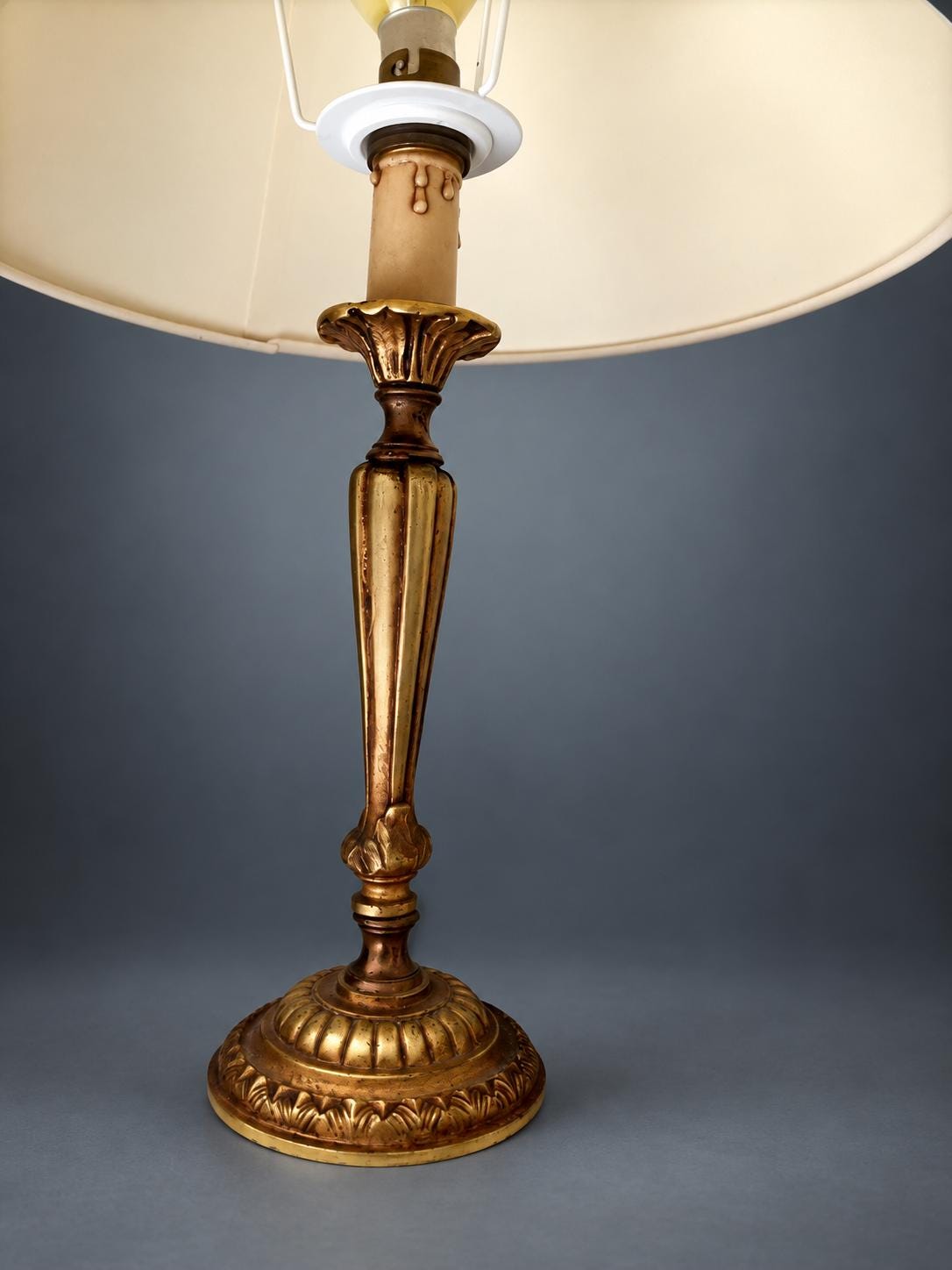 Candlestick Table Lamp in Gilt Metal, Fluted Stem with Leaf-Cast Cup and Base, Candle Sleeve, Cream Cone Shade
