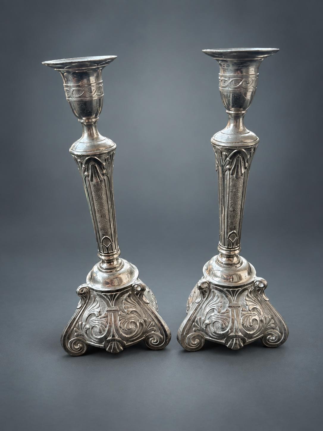 Pair of Baroque Revival Candlesticks, Silver-Tone Metal, Triangular Scroll-Foot Bases with Acanthus Relief, Textured Stems