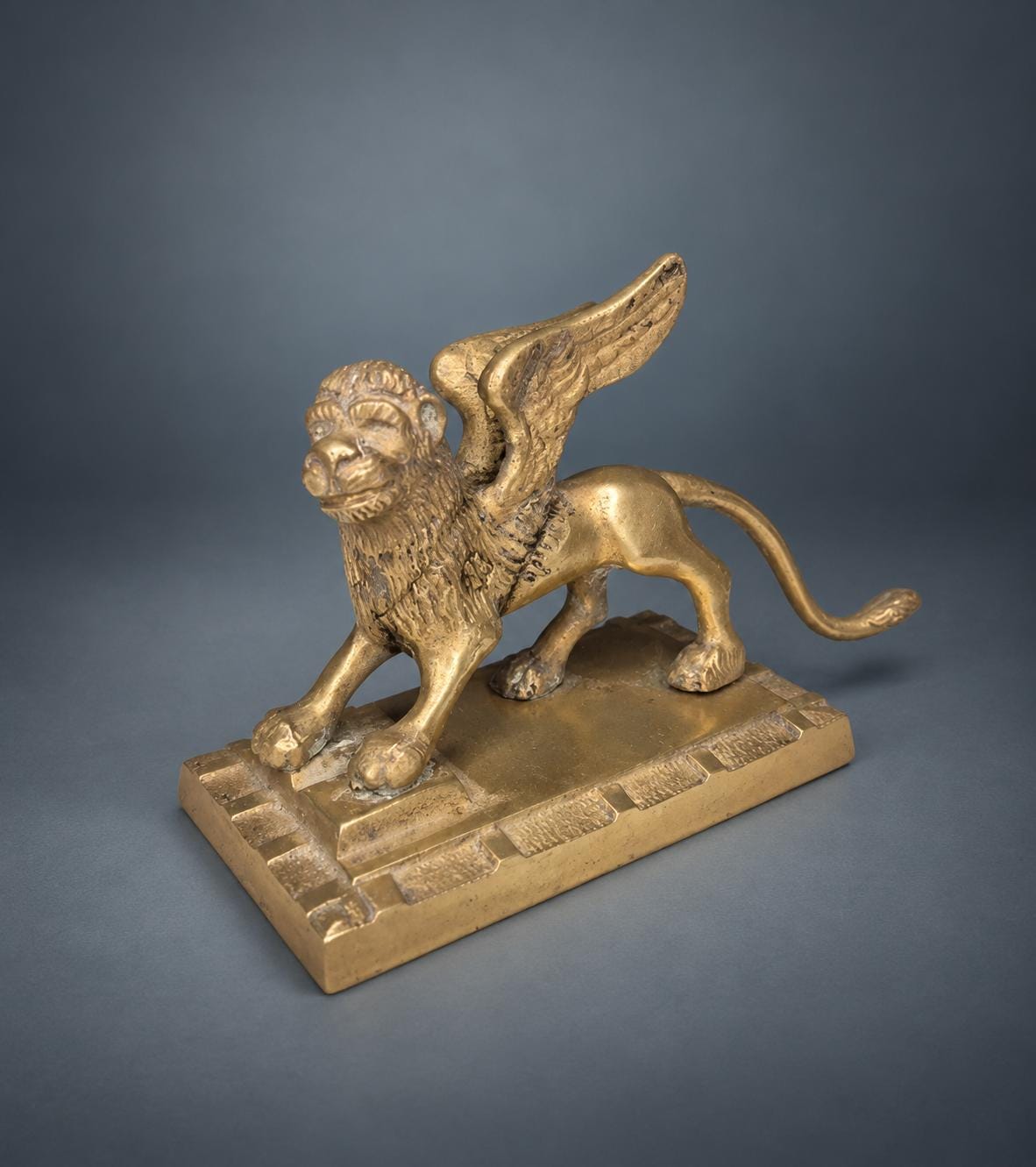 Winged Lion Figure in Patinated Metal on Stepped Base, Lion of Saint Mark Style, Desk Ornament or Paperweight