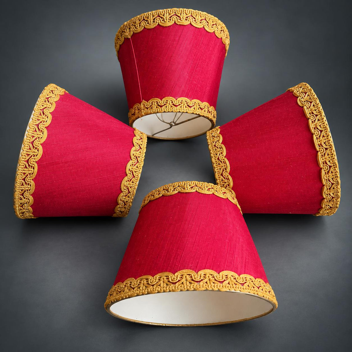 Pair of Louis XVI Style Two-Arm Wall Sconces, Gilt Metal with Urn Finials, Four Red Clip-On Shades with Gold Braid