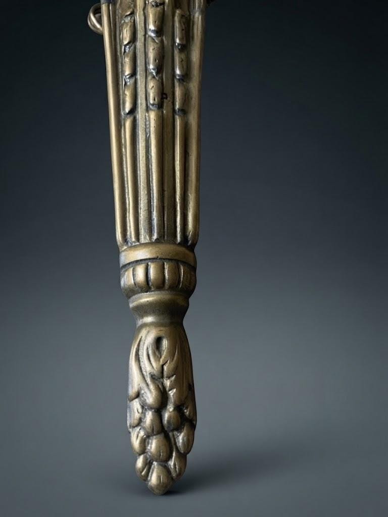 Set of Three Louis XVI Style Two-Arm Wall Sconces, Quiver Backplates with Ribbons, Leaf Cups and Pine Cone Drops
