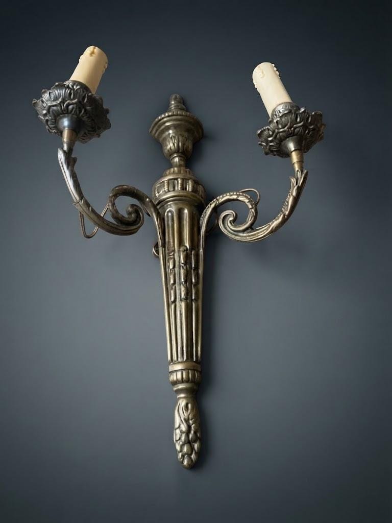 Set of Three Louis XVI Style Two-Arm Wall Sconces, Quiver Backplates with Ribbons, Leaf Cups and Pine Cone Drops