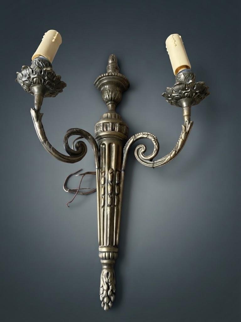 Set of Three Louis XVI Style Two-Arm Wall Sconces, Quiver Backplates with Ribbons, Leaf Cups and Pine Cone Drops