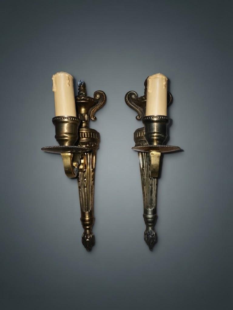 Pair of Louis XVI Style Single-Arm Wall Sconces, Gold-Tone Metal with Fluted Back Plates, Urn Tops and Beaded Drip Pans