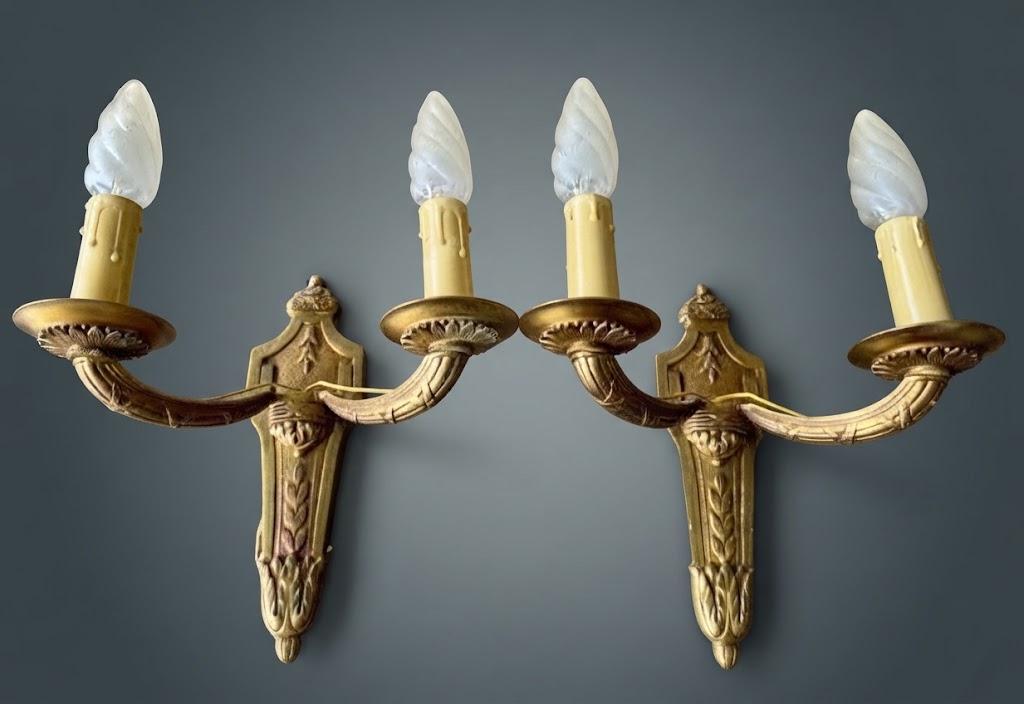 Pair of Louis XVI Style Two-Arm Wall Sconces, Gilt Metal with Acanthus Arms and Shield-Shaped Back Plates