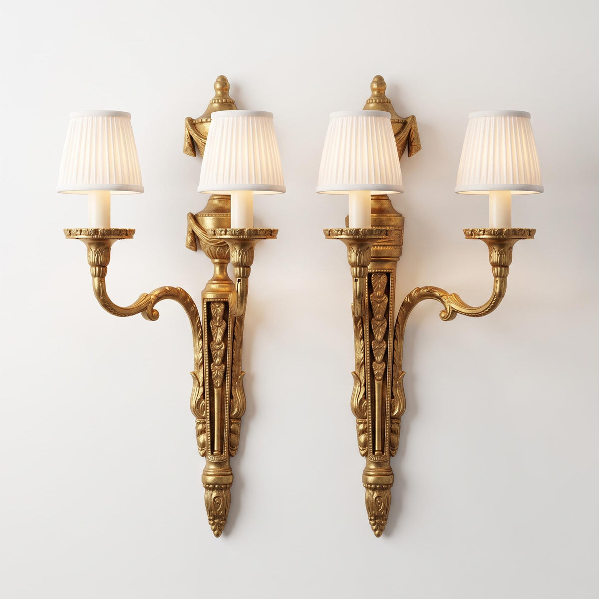 Vintage Pair of Louis XVI Style Two-Arm Wall Sconces, Gold-Tone Metal with Draped Urns, Pierced Fluted Shafts and Acanthus Arms