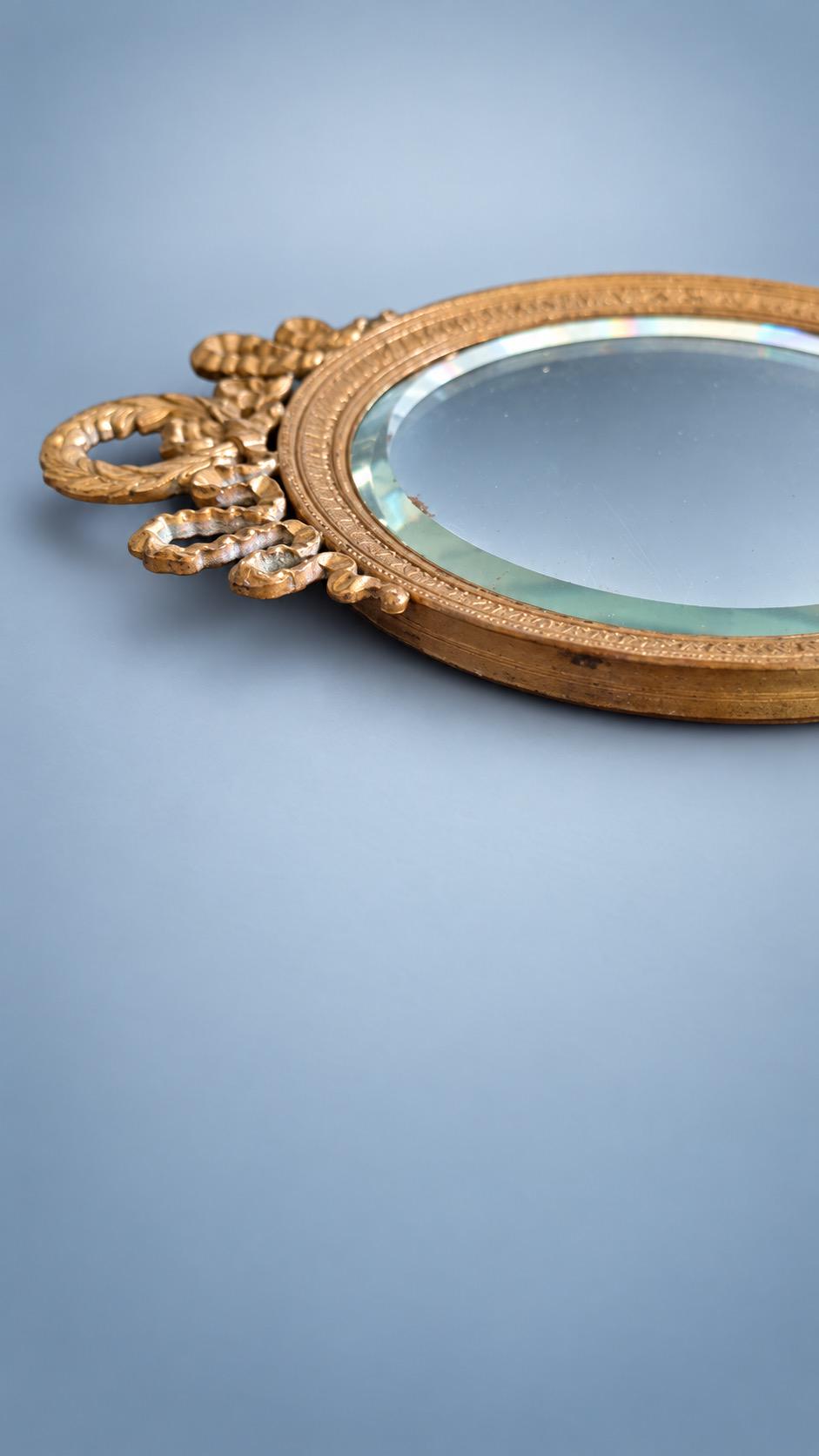 Louis XVI Style Gold-Tone Hand Mirror, Laurel Wreath and Ribbon Frame, Beveled Glass, 28.5 cm