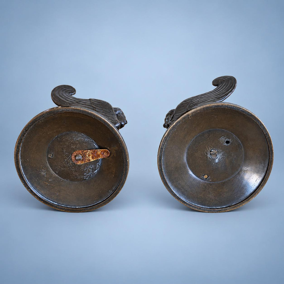 Vintage Pair of Neoclassical Style Winged Sphinx Figures, Patinated Metal on Palmette Bases, Sold as Bookends