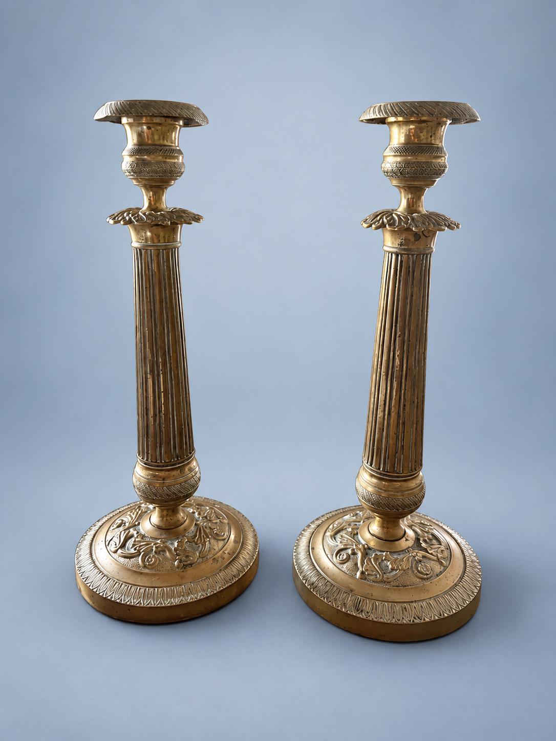 Vintage Pair of Empire Style Patinated Brass-Tone Candlesticks, Fluted Columns, Acanthus Collars and Foliate Bases