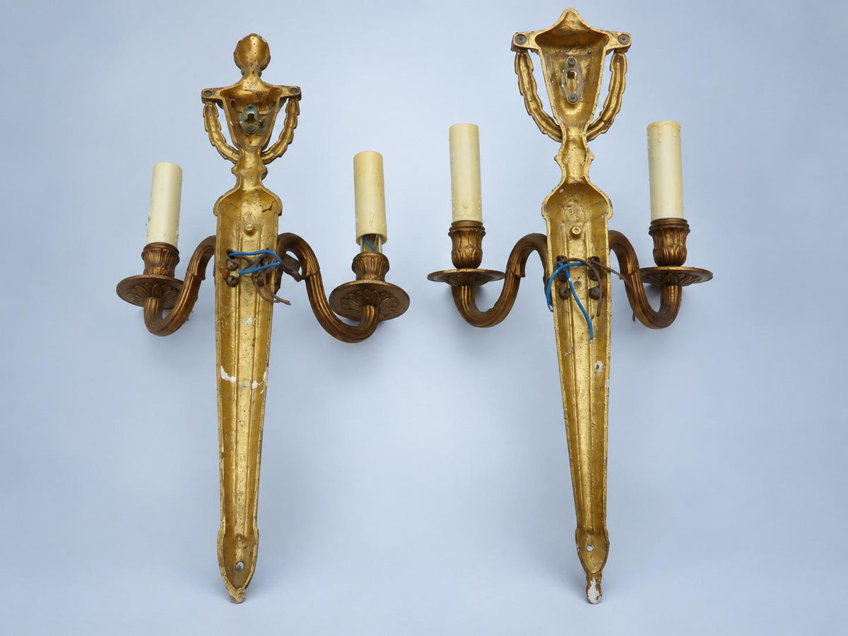 Vintage Pair of Louis XVI Style Gilt Metal Two-Arm Wall Sconces with Urn and Garland Crest