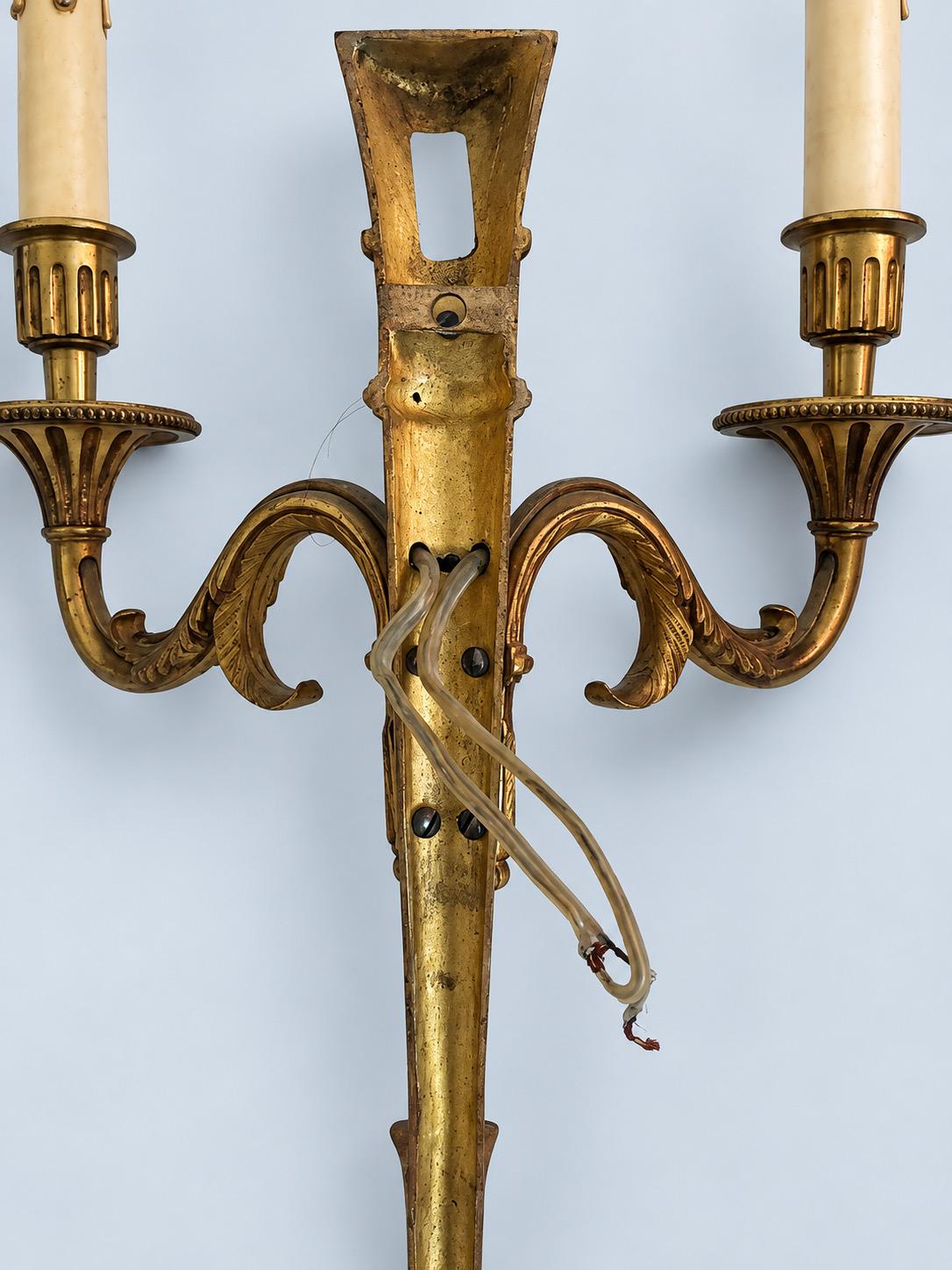 Vintage Pair of Louis XVI Style Gilt Metal Two-Arm Wall Sconces with Fluted Shaft and Rosettes