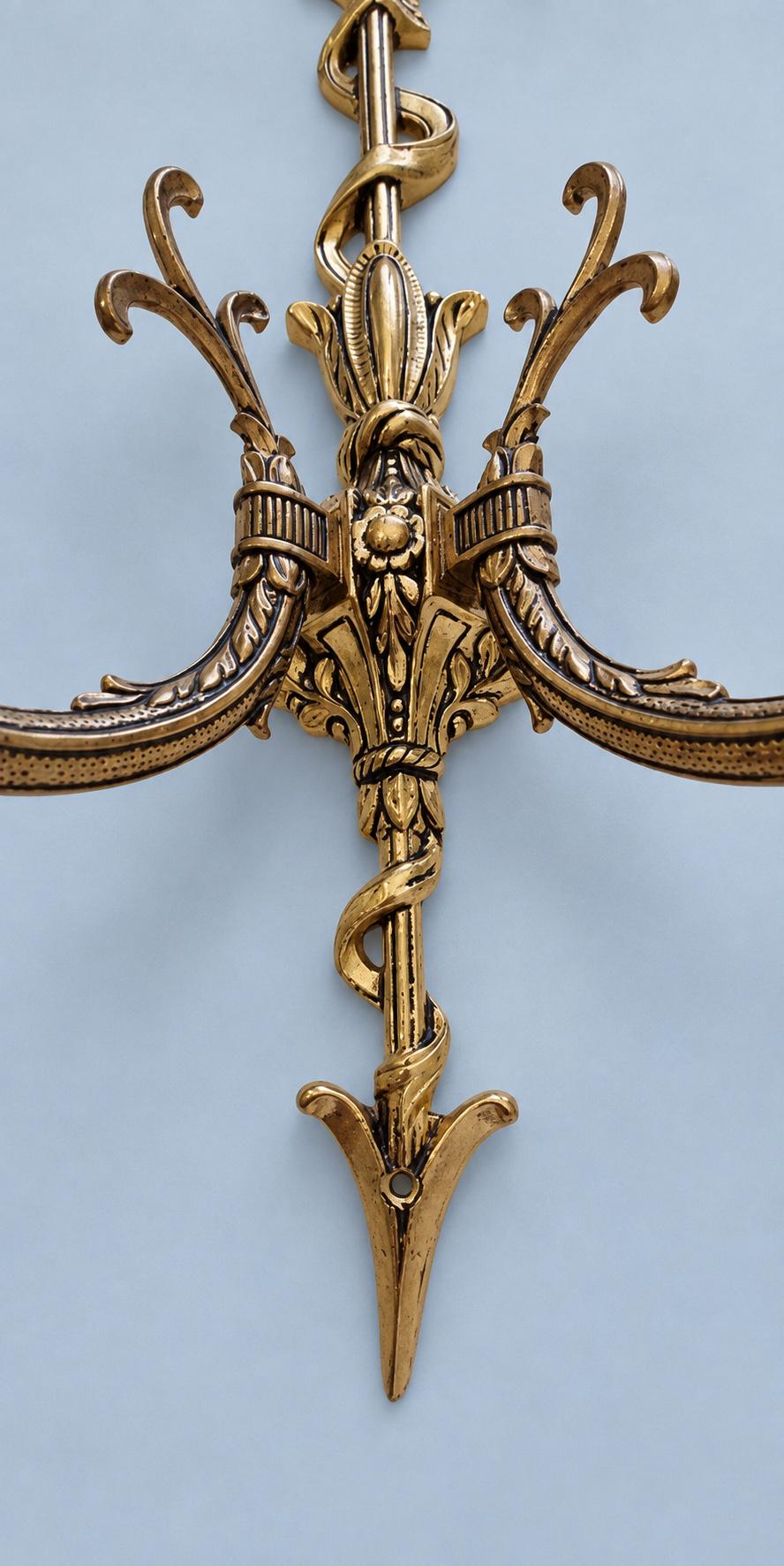 Vintage Pair of Louis XVI Style Gilt Metal Arrow and Ribbon Two-Arm Wall Sconces
