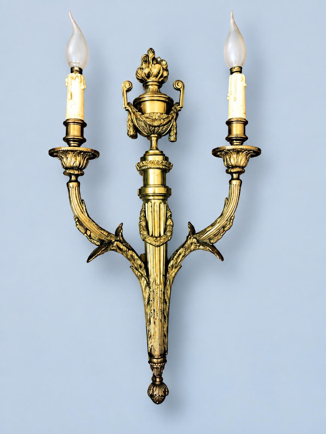 Large Pair of Louis XVI Style Gilt Bronze Wall Sconces, Handled Flame Urns, Fluted Shafts and Sweeping Leaf Arms