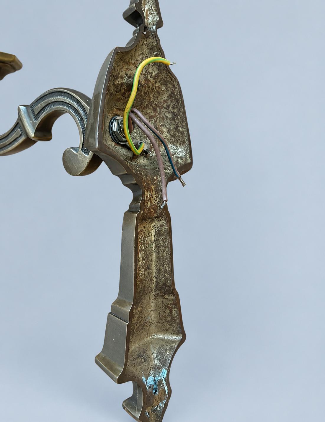 Pair of Antique Style Single-Arm Wall Sconces, Faceted Backplates, Octagonal Drip Pans and Hanging Ring Finials