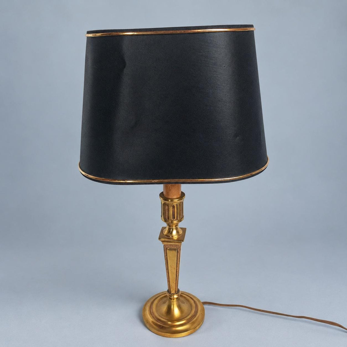 Vintage 1980s Louis XVI Style Brass-Tone Candlestick Table Lamp with Black and Gold Oval Shade