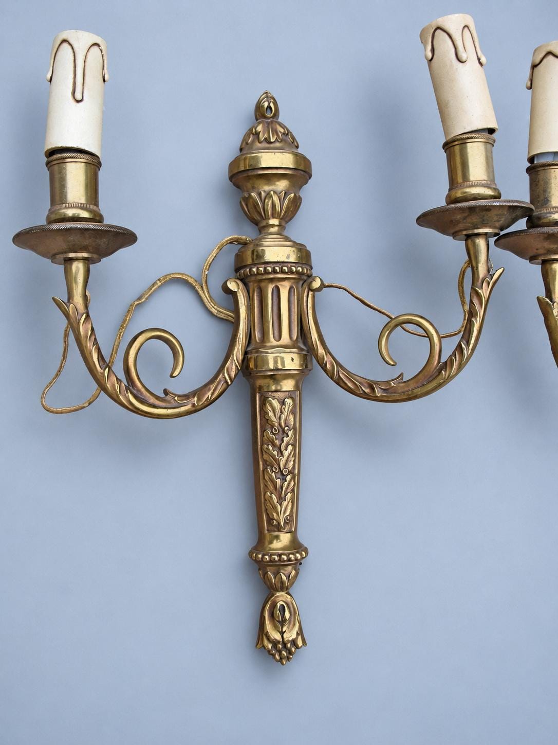 Vintage Pair of Louis XVI Style Brass-Tone Two-Arm Wall Sconces with Urn and Oak-Leaf Shaft