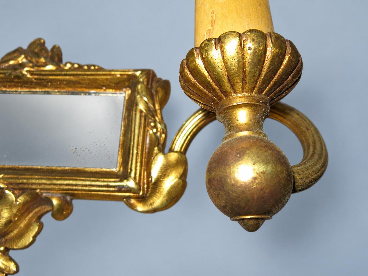 Vintage Pair of Louis XVI Style Two-Arm Gilt Metal Mirror Wall Sconces with Laurel Crests