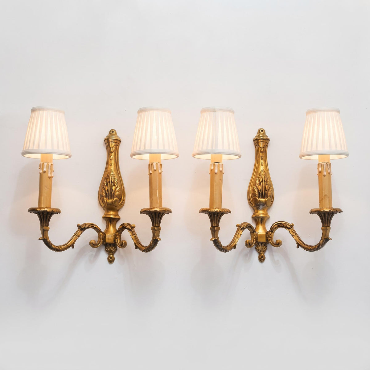 Vintage Pair of French Louis XVI Style Two-Arm Bronze-Tone Wall Sconces with Acanthus Back Plates