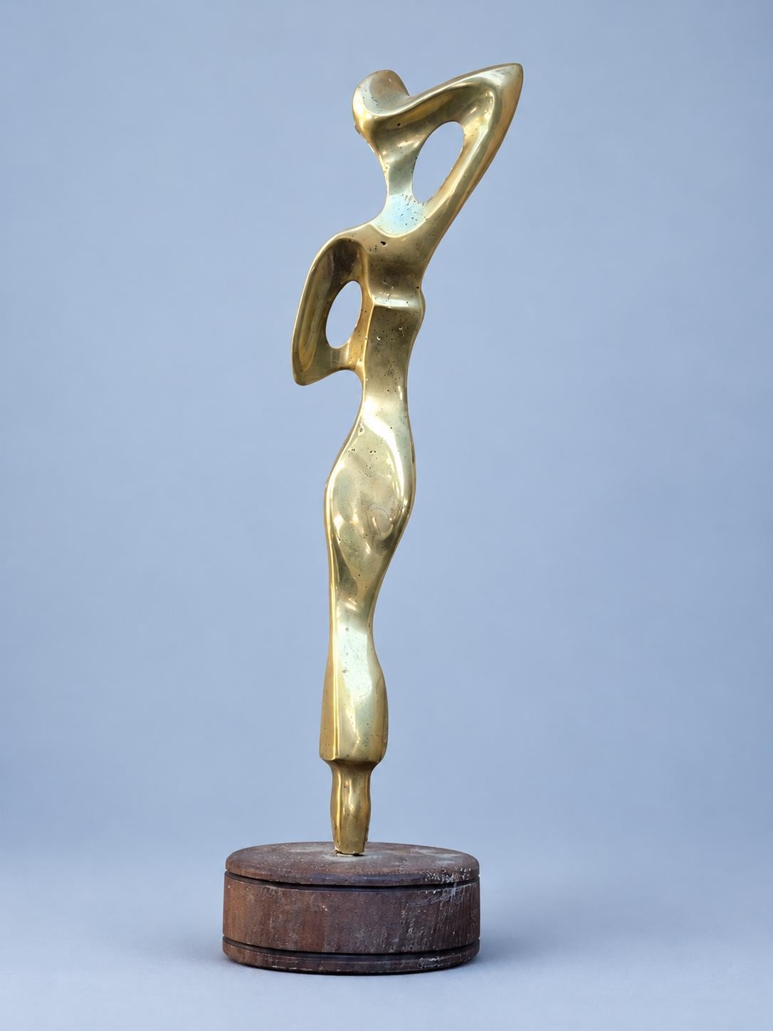 Contemporary Abstract Female Figure Sculpture, Gold-Tone Metal with Raised Arms, Modernist Style on Round Base, 24 cm