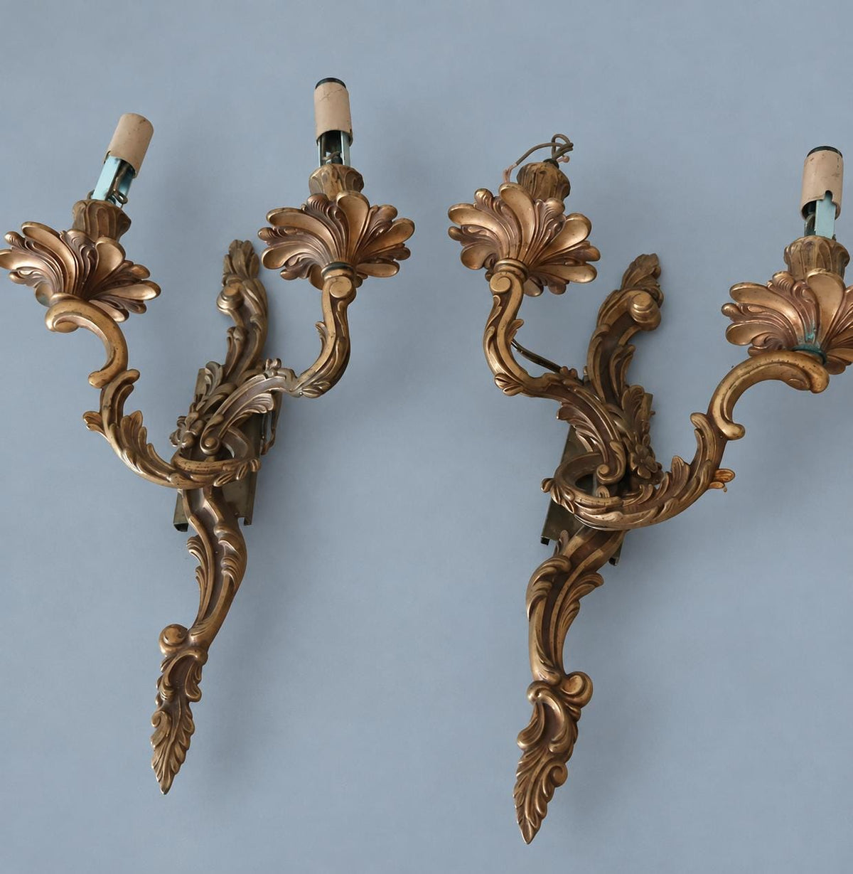 Vintage Pair of Louis XV Rocaille Style Brass Wall Sconces, Mirror-Image Scrolled Arms with Shell Bobèches, Two Lights Each, 37 cm