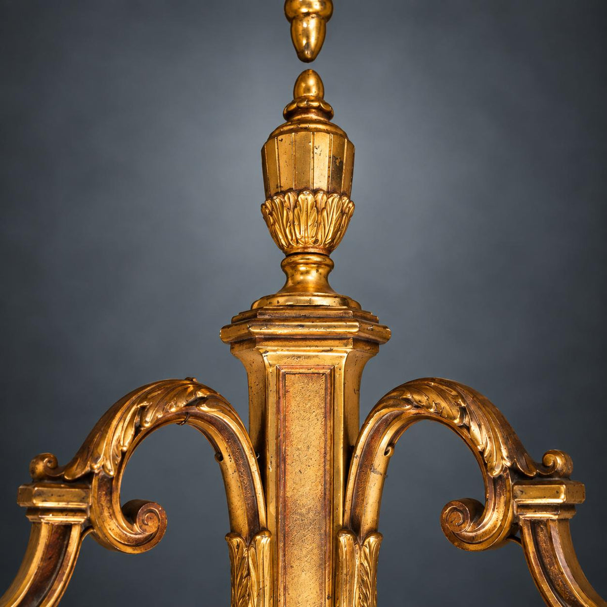 Pair of Louis XVI Style Two-Arm Wall Sconces, Gilt Metal with Urn Finials, Four Red Clip-On Shades with Gold Braid