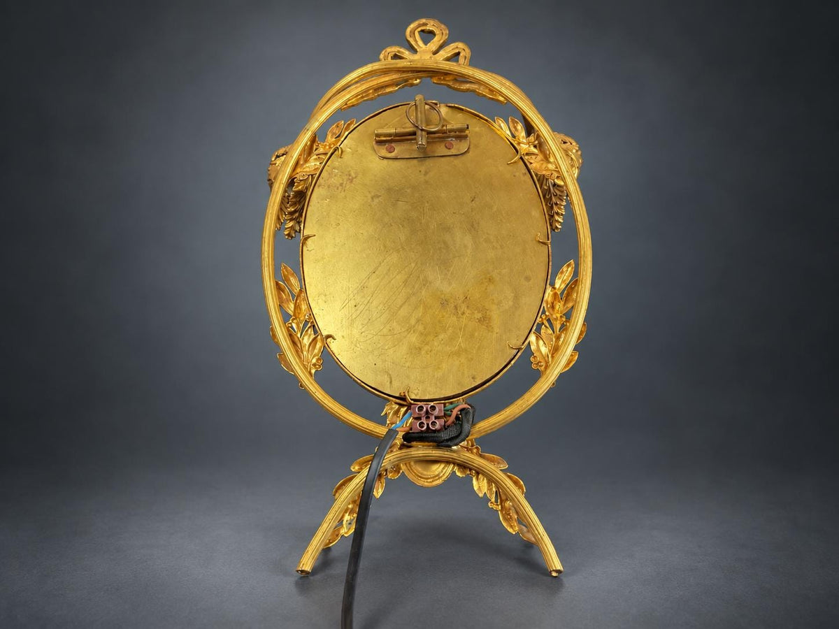 Louis XVI Style Mirrored Wall Sconce, Gilt Metal Girandole with Bevelled Oval Mirror, Ribbon Bow and Laurel, Two Lights