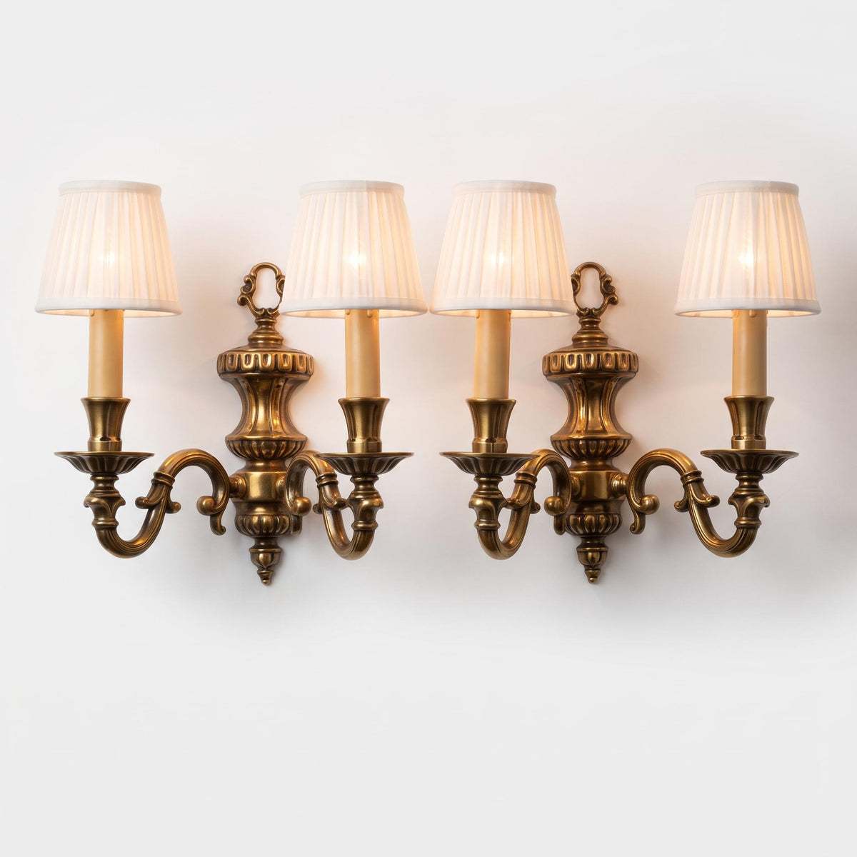Pair of French Vintage Style Two-Arm Wall Sconces, Bronze-Tone Metal Urn Bodies with Scrolled Arms and Candle Sleeves