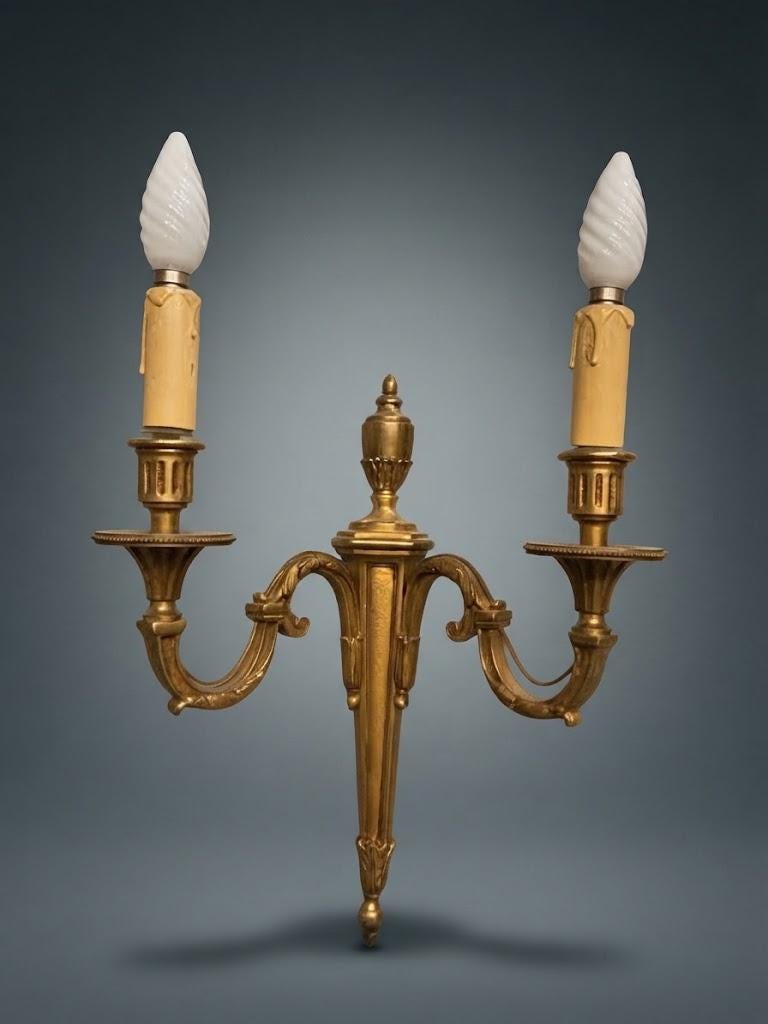 Pair of Louis XVI Style Two-Arm Wall Sconces, Gilt Metal with Scrolled Arms, Beaded Drip Pans and Urn Finials