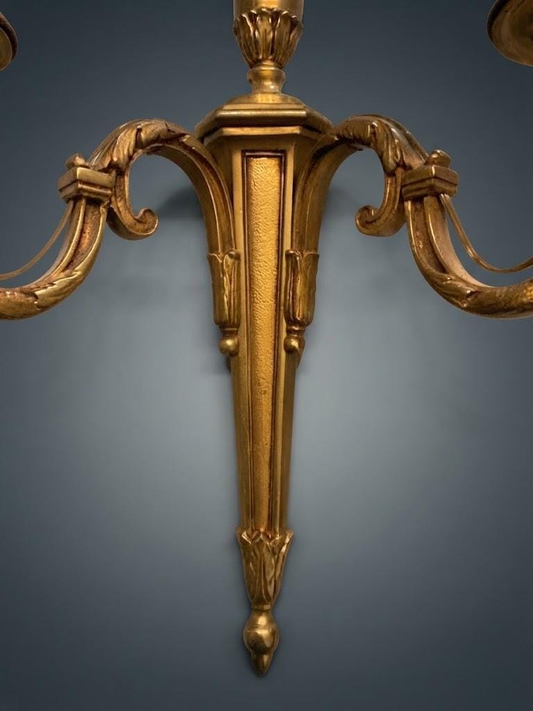 Pair of Louis XVI Style Two-Arm Wall Sconces, Gilt Metal with Scrolled Arms, Beaded Drip Pans and Urn Finials