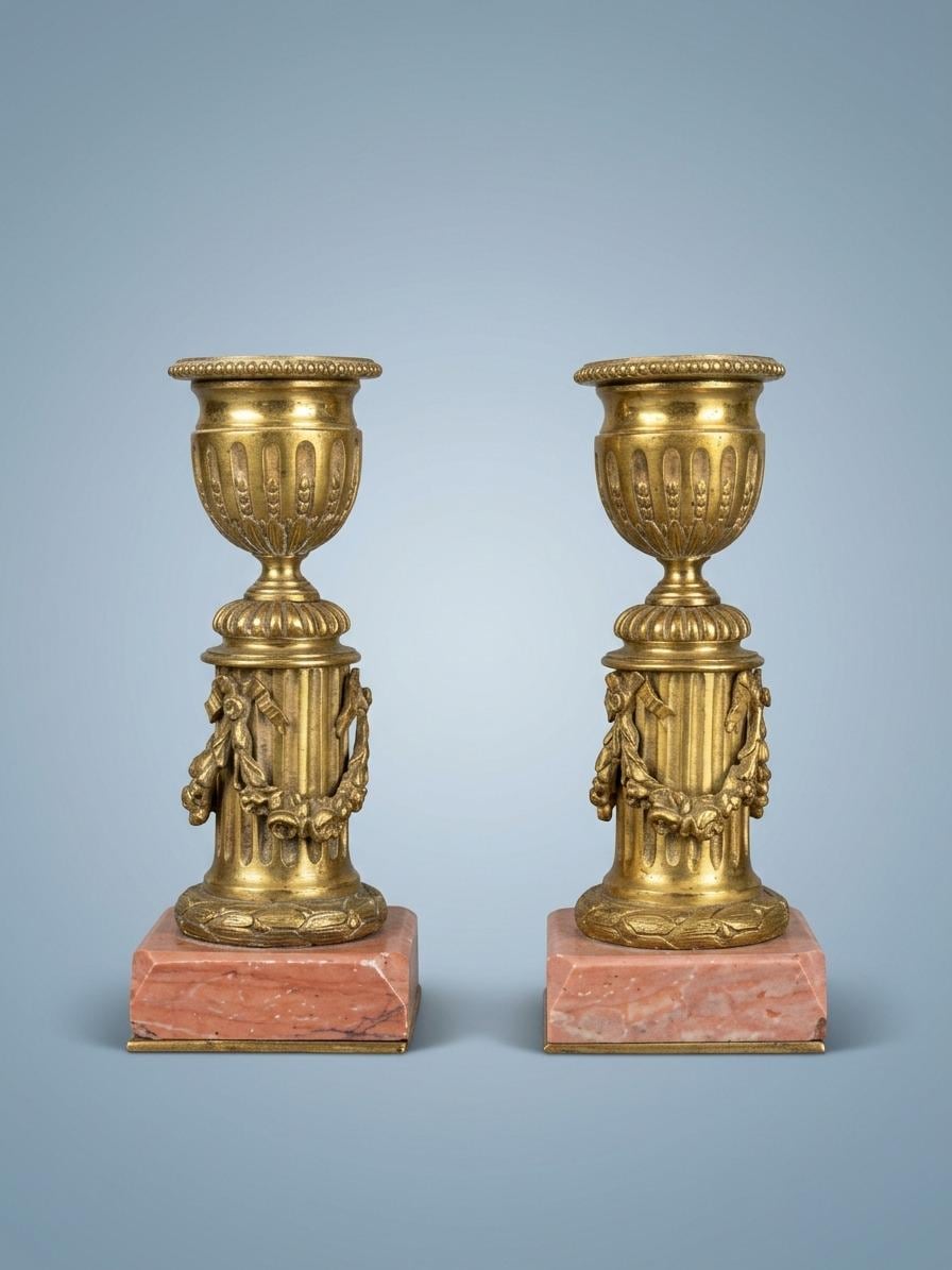 Antique Pair of Louis XVI Style Small Gilt Metal Candlesticks on Pink Veined Stone Plinths, Fluted Columns with Festoons