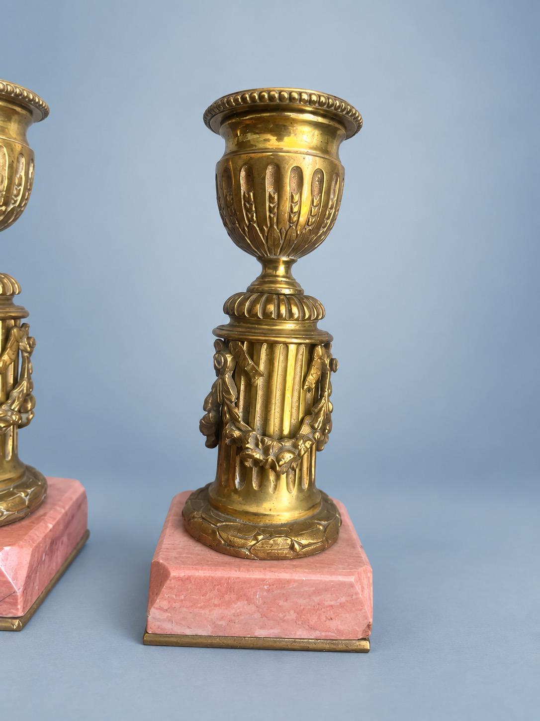 Antique Pair of Louis XVI Style Small Gilt Metal Candlesticks on Pink Veined Stone Plinths, Fluted Columns with Festoons