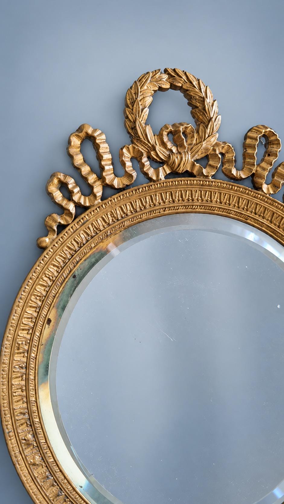 Louis XVI Style Gold-Tone Hand Mirror, Laurel Wreath and Ribbon Frame, Beveled Glass, 28.5 cm